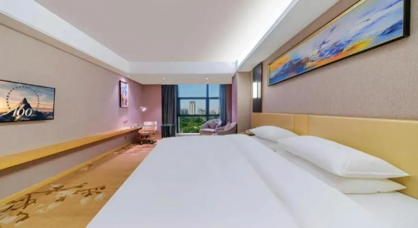 Bed in Vienna Hotel Guangdong Zhongshan Xiaolan High-Speed Railway Station