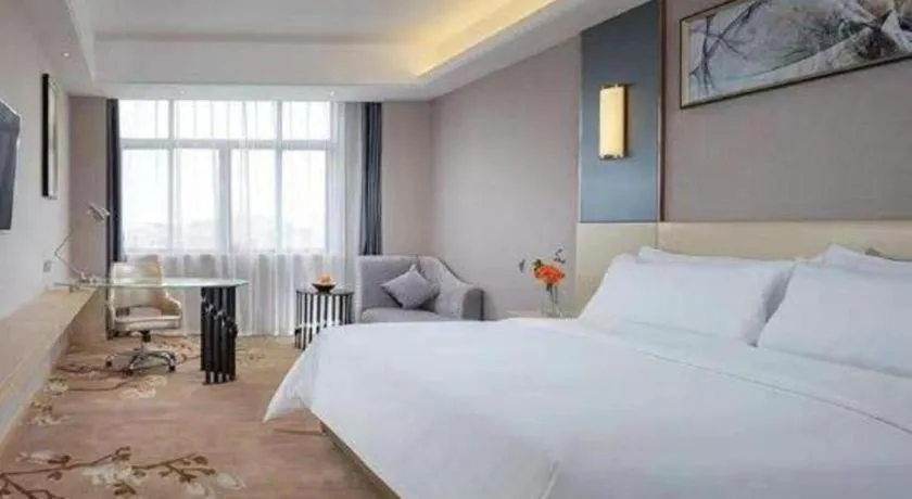 Bed in Vienna Hotel Guangdong Zhongshan Xiaolan High-Speed Railway Station
