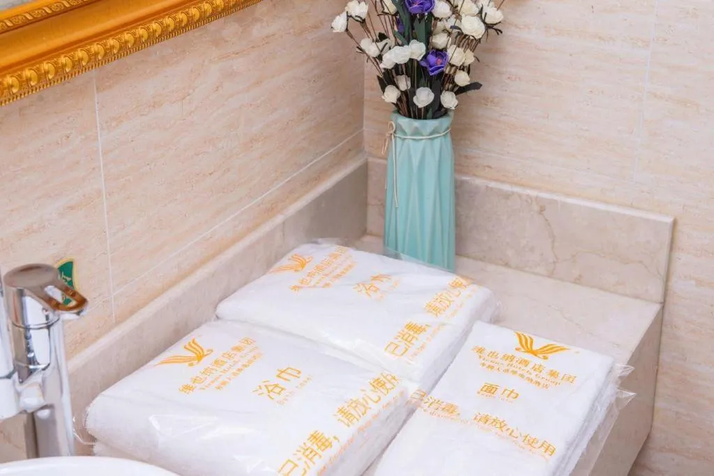 Bed in Vienna Hotel Xuzhou Junsheng Plaza Benteng Avenue Metro Station