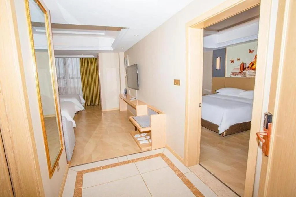 Bed in Vienna Hotel Xuzhou Junsheng Plaza Benteng Avenue Metro Station