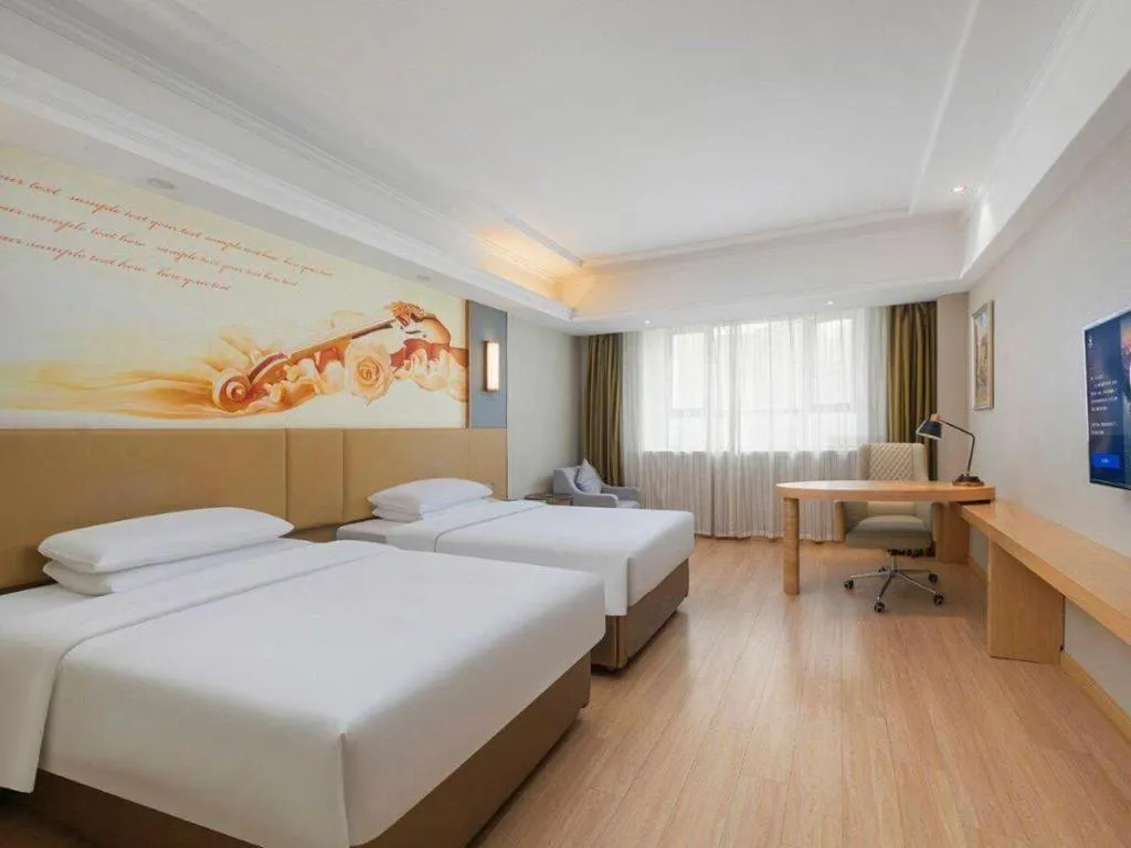 Bed in Vienna Hotel Xuzhou Junsheng Plaza Benteng Avenue Metro Station