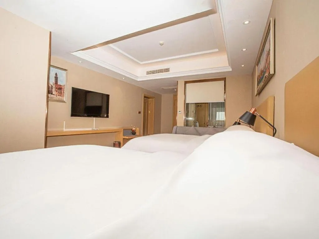 Bed in Vienna Hotel Xuzhou Junsheng Plaza Benteng Avenue Metro Station