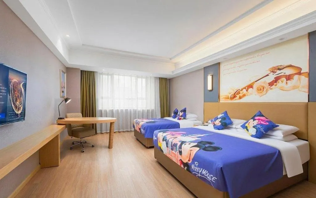 Bed in Vienna Hotel Xuzhou Junsheng Plaza Benteng Avenue Metro Station