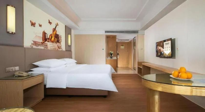 Bed in Venus International Hotel Guangdong Huizhou West Lake