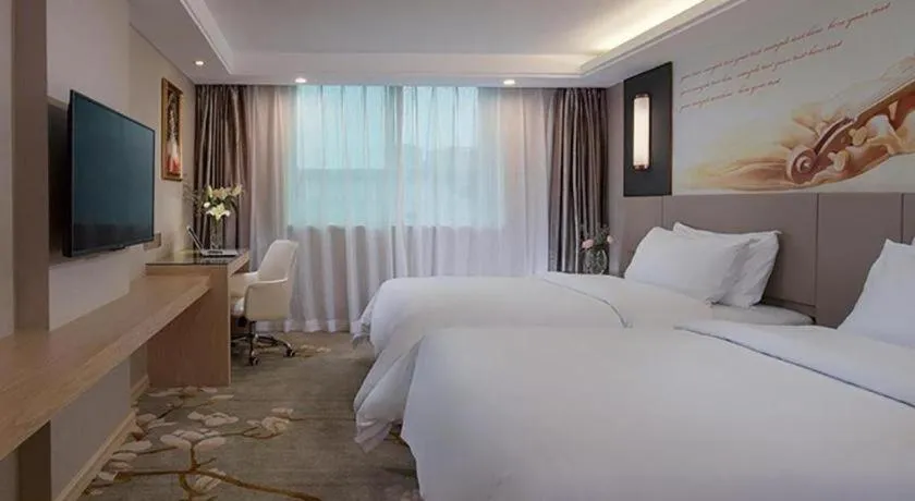 Bed in Venus International Hotel Guangdong Huizhou West Lake