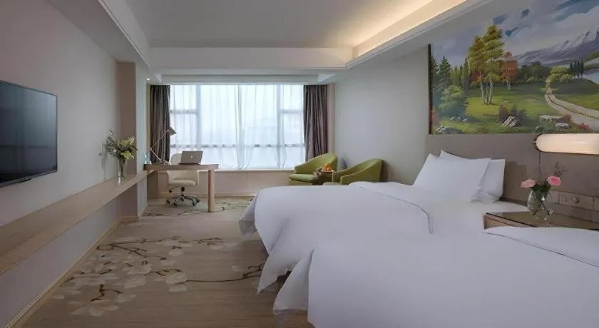 Bed in Venus International Hotel Guangdong Huizhou West Lake