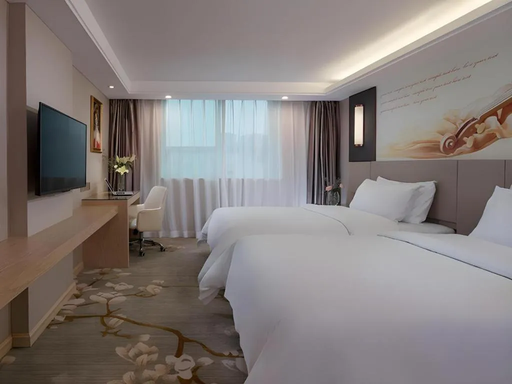 Bed in Venus International Hotel Guangdong Huizhou West Lake