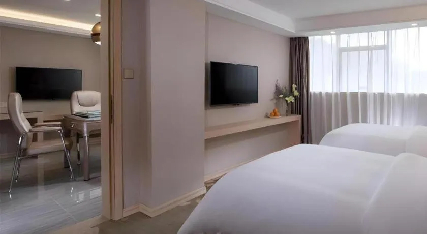 Bed in Venus International Hotel Guangdong Huizhou West Lake