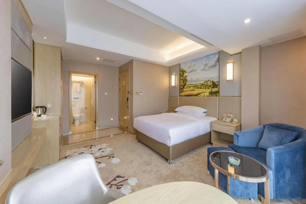 Bed in Vienna Hotel Fuzhou Changle Shouzhan Hangcheng Metro Station