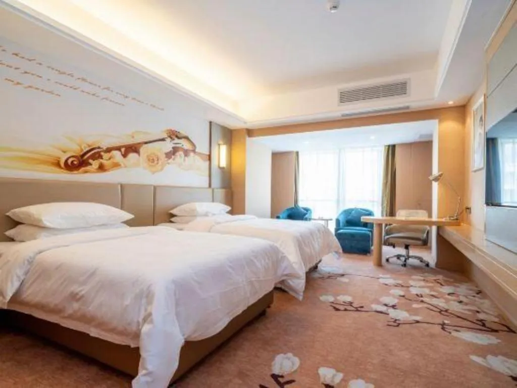 Bed in Vienna Hotel Fuzhou Changle Shouzhan Hangcheng Metro Station