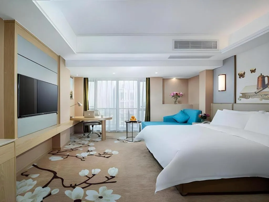 Bed in Vienna Hotel Fuzhou Changle Shouzhan Hangcheng Metro Station