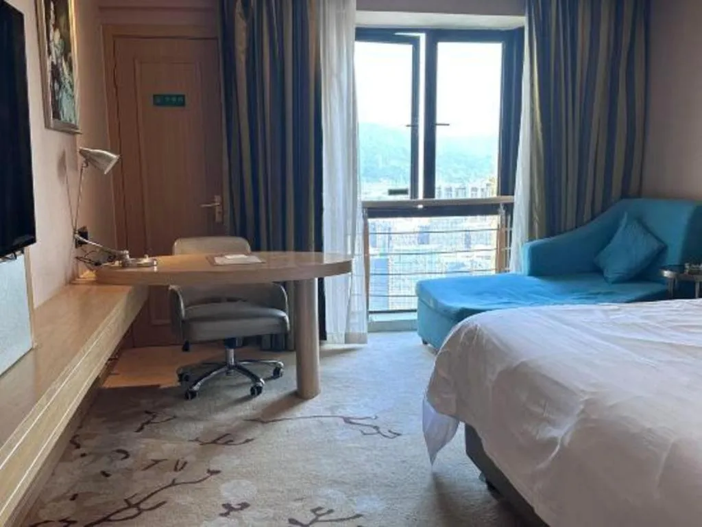 Bed in Vienna Hotel Fuzhou Changle Shouzhan Hangcheng Metro Station