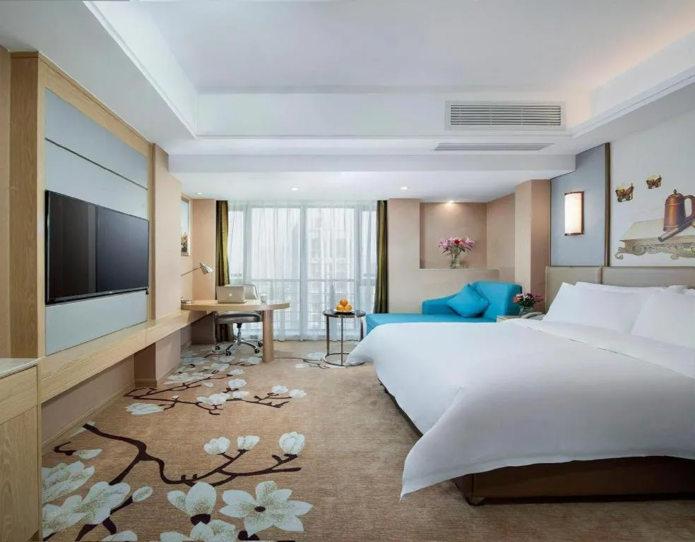 Bed in Vienna Hotel Fuzhou Changle Shouzhan Hangcheng Metro Station