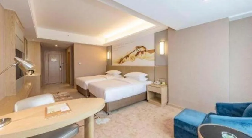 Bed in Vienna Hotel Fuzhou Changle Shouzhan Hangcheng Metro Station