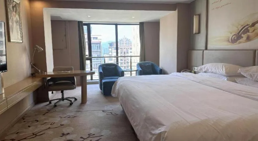 Bed in Vienna Hotel Fuzhou Changle Shouzhan Hangcheng Metro Station