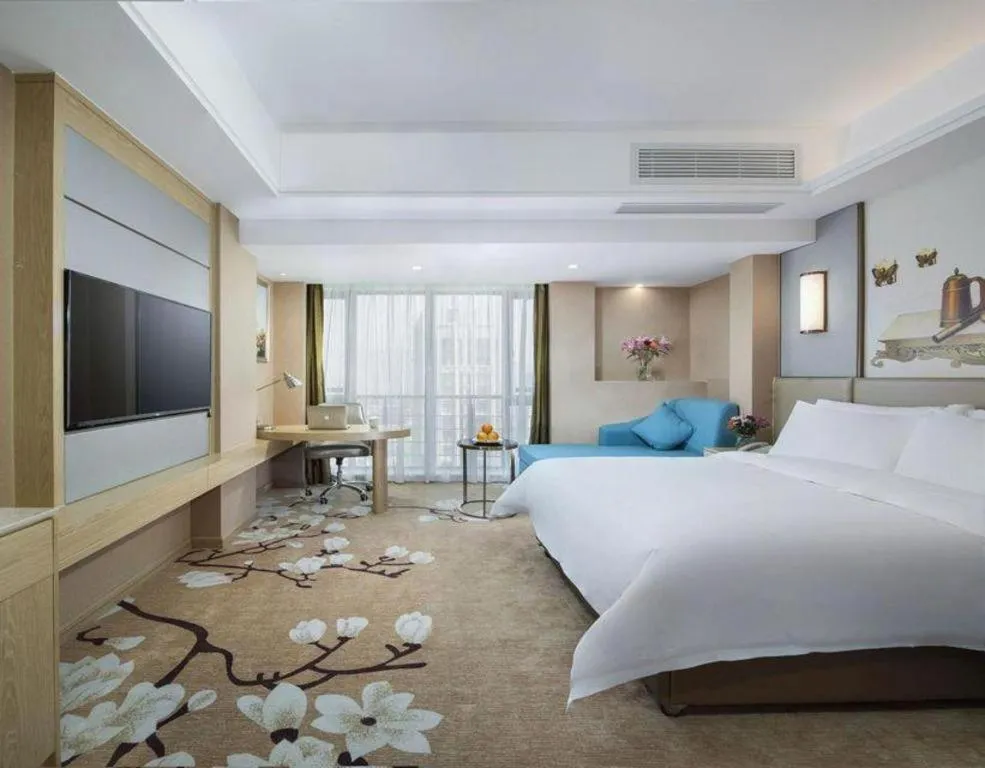 Bed in Vienna Hotel Fuzhou Changle Shouzhan Hangcheng Metro Station