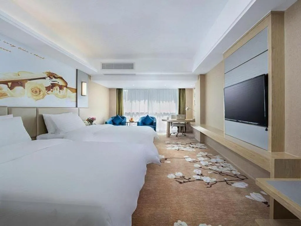 Bed in Vienna Hotel Fuzhou Changle Shouzhan Hangcheng Metro Station