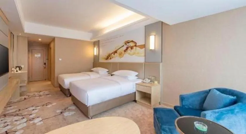 Bed in Vienna Hotel Fuzhou Changle Shouzhan Hangcheng Metro Station
