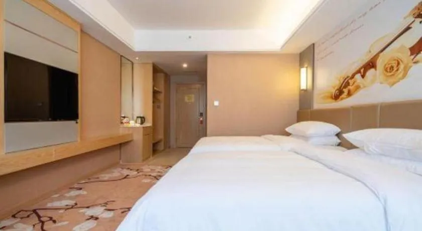 Bed in Vienna Hotel Fuzhou Changle Shouzhan Hangcheng Metro Station