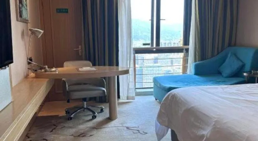 Bed in Vienna Hotel Fuzhou Changle Shouzhan Hangcheng Metro Station