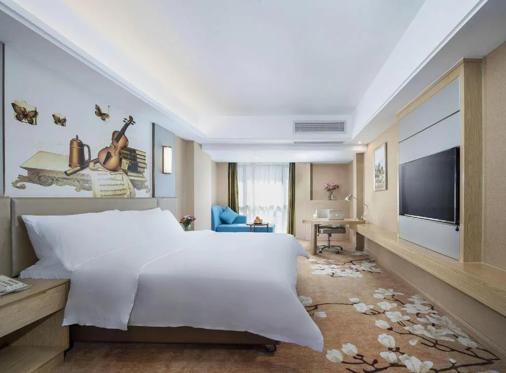 Bed in Vienna Hotel Fuzhou Changle Shouzhan Hangcheng Metro Station