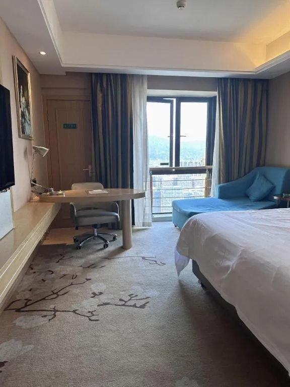 Bed in Vienna Hotel Fuzhou Changle Shouzhan Hangcheng Metro Station