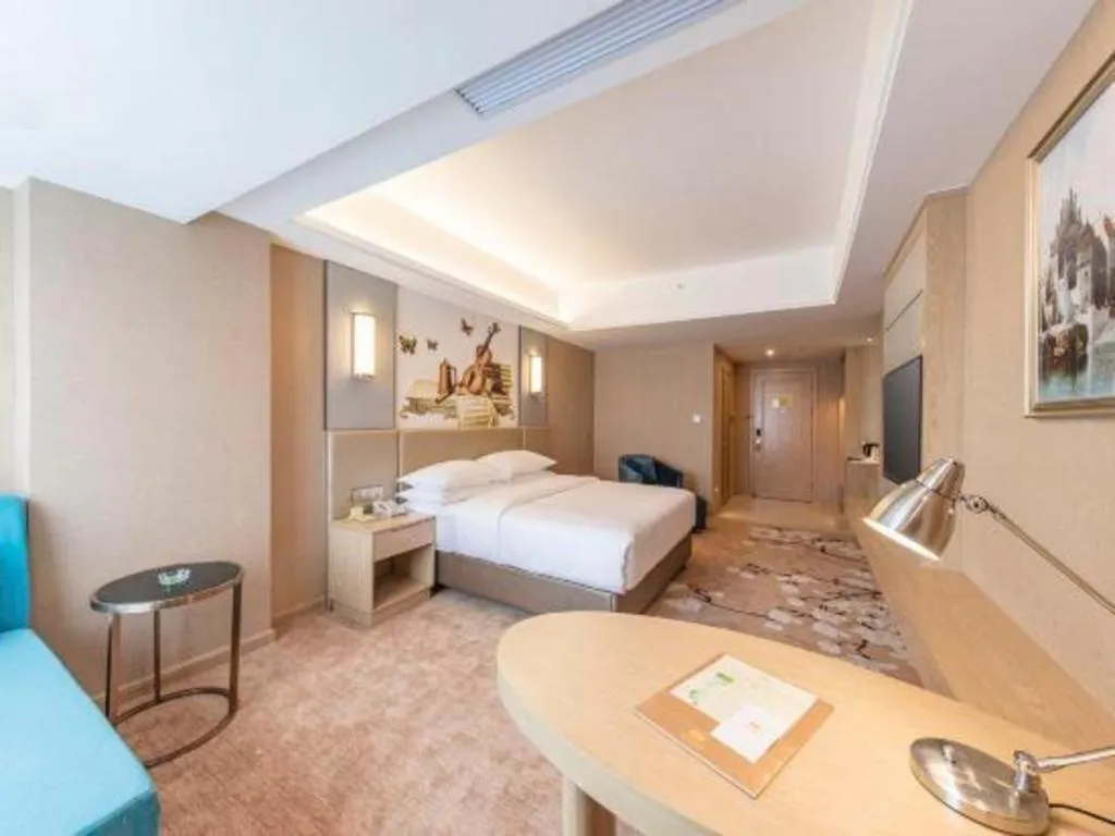 Bed in Vienna Hotel Fuzhou Changle Shouzhan Hangcheng Metro Station