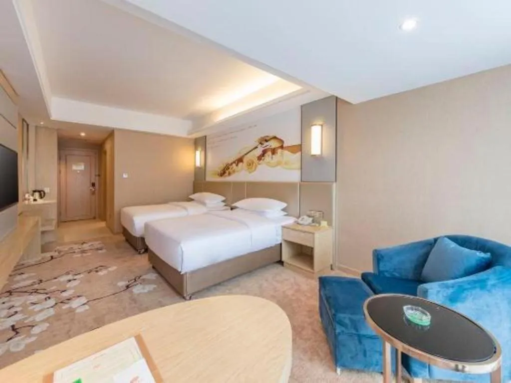 Bed in Vienna Hotel Fuzhou Changle Shouzhan Hangcheng Metro Station