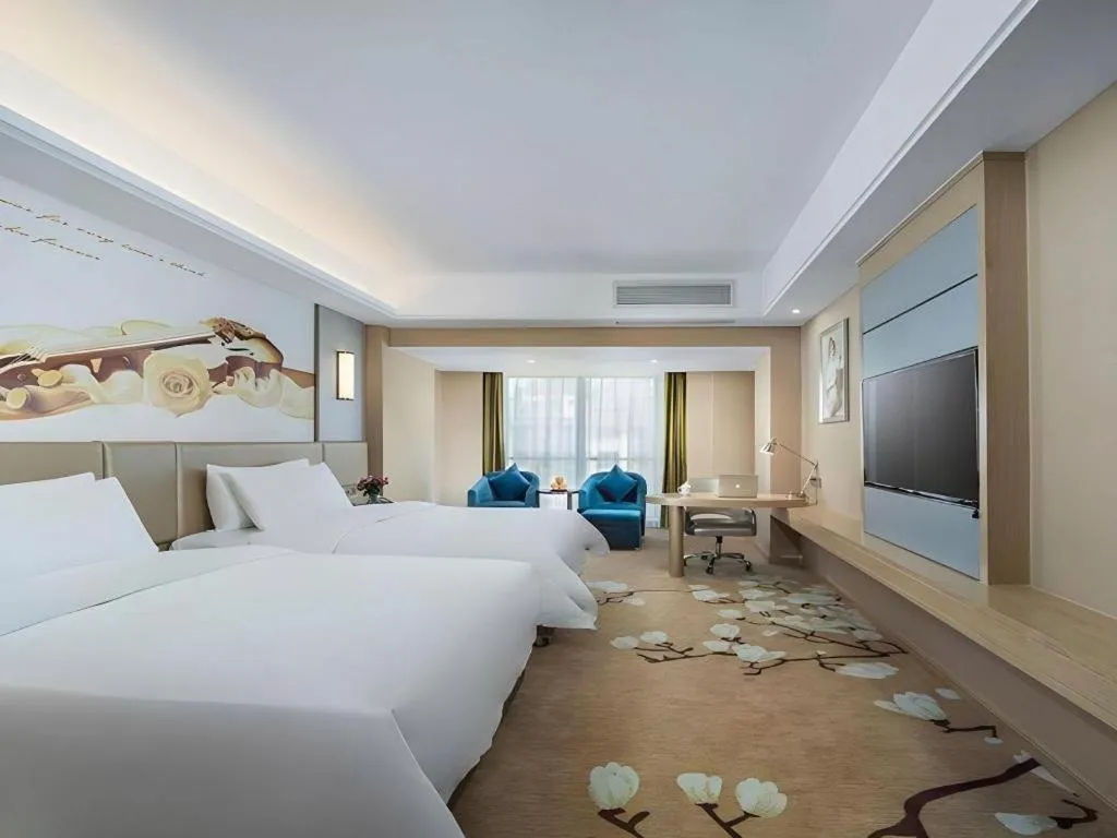 Bed in Vienna Hotel Fuzhou Changle Shouzhan Hangcheng Metro Station