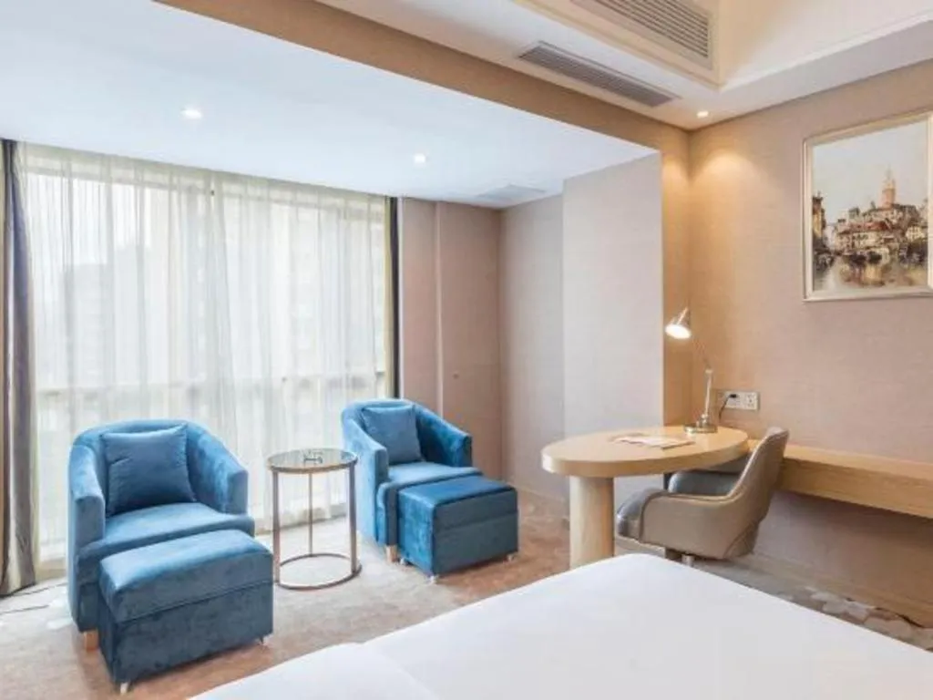 Bed in Vienna Hotel Fuzhou Changle Shouzhan Hangcheng Metro Station