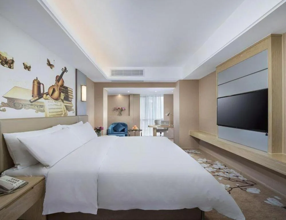 Bed in Vienna Hotel Fuzhou Changle Shouzhan Hangcheng Metro Station