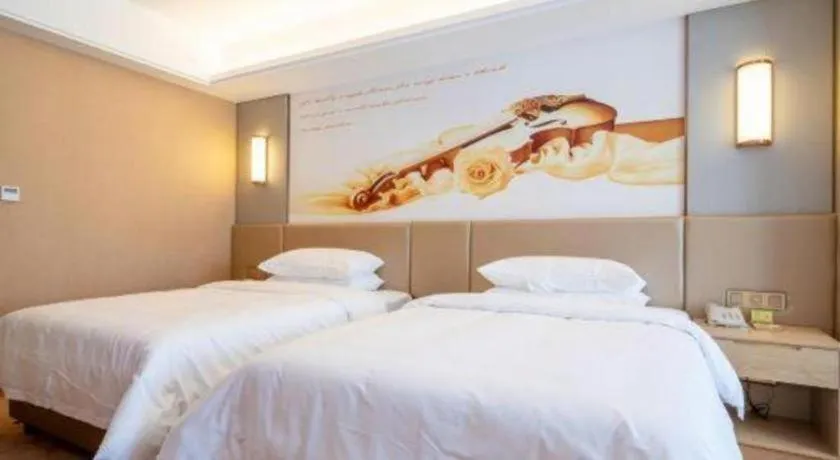 Bed in Vienna Hotel Fuzhou Changle Shouzhan Hangcheng Metro Station