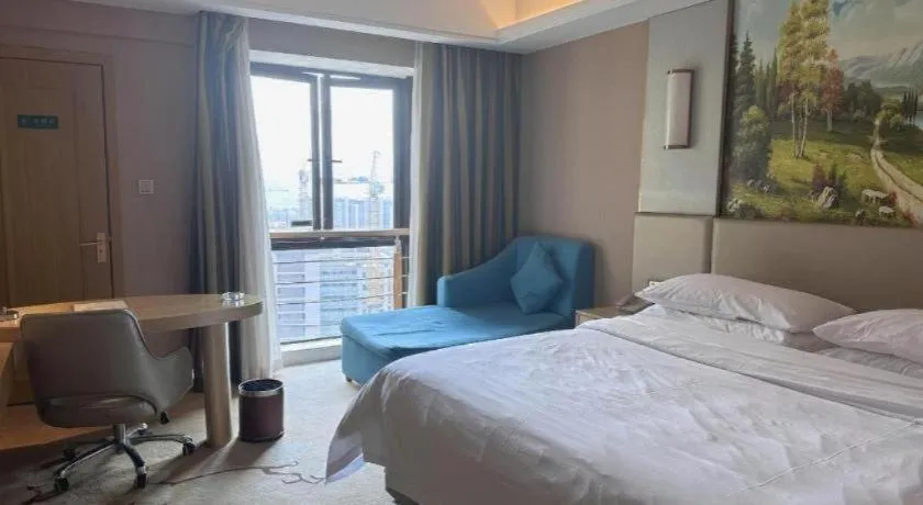 Bed in Vienna Hotel Fuzhou Changle Shouzhan Hangcheng Metro Station