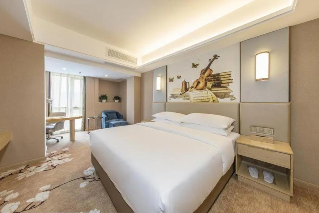 Bed in Vienna Hotel Fuzhou Changle Shouzhan Hangcheng Metro Station