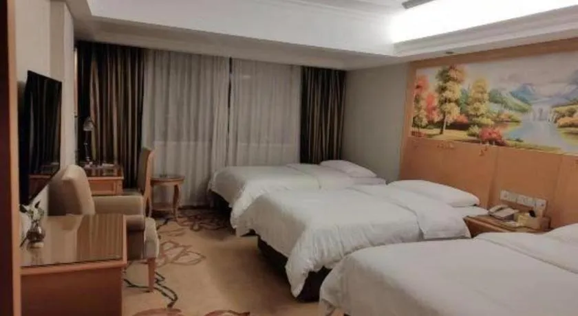 Bed in Vienna Hotel Guangxi Guilin Yongfu Station