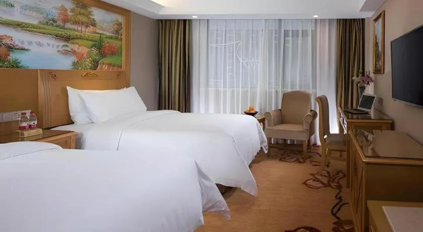 Bed in Vienna Hotel Guangxi Guilin Yongfu Station