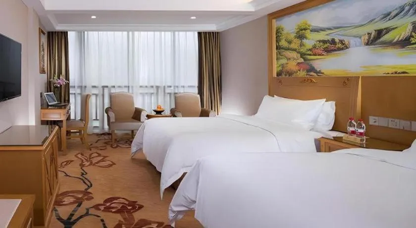 Bed in Vienna Hotel Guangxi Guilin Yongfu Station