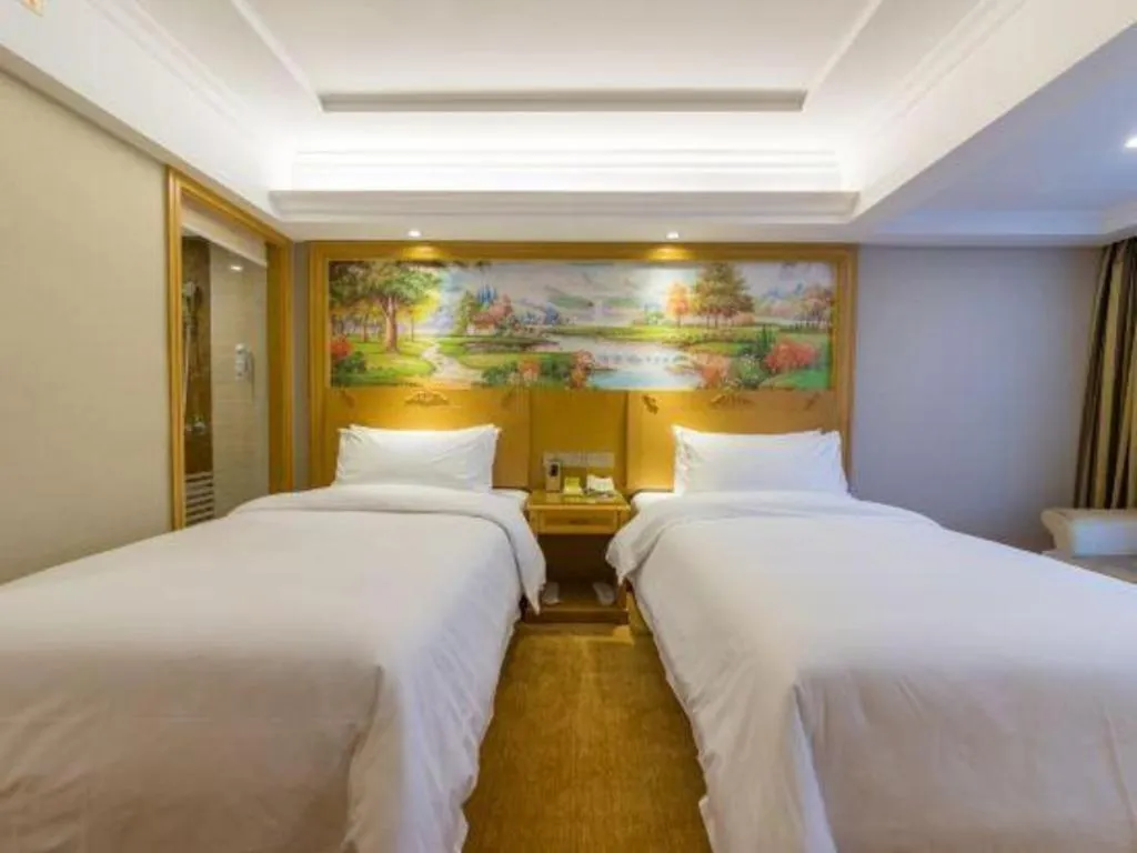 Bed in Vienna Hotel Guangxi Guilin Yongfu Station