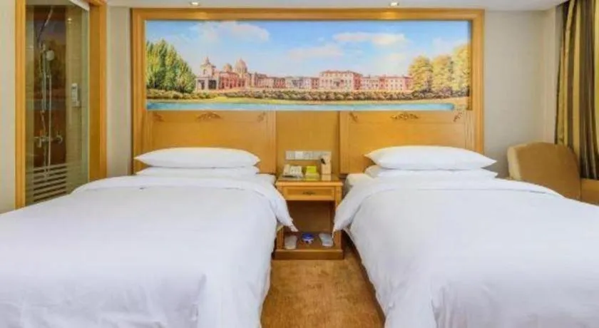 Bed in Vienna Hotel Guangxi Guilin Yongfu Station