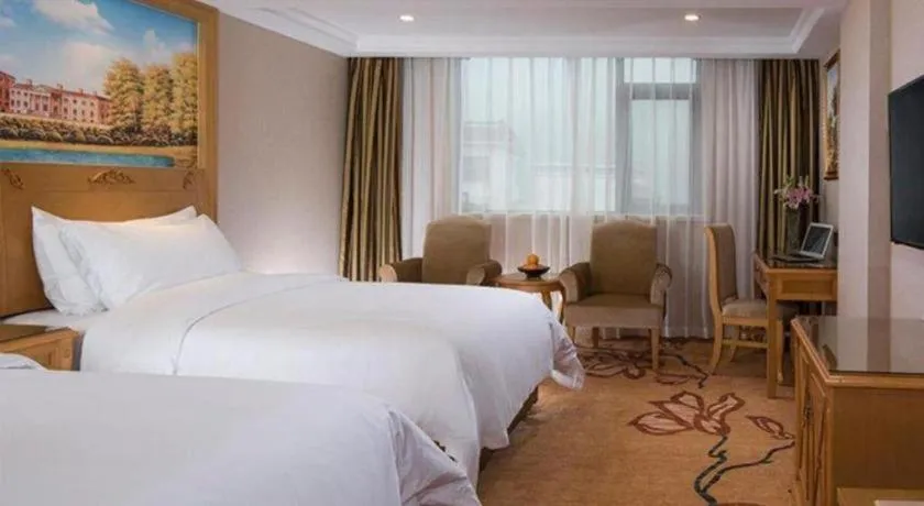 Bed in Vienna Hotel Guangxi Guilin Yongfu Station