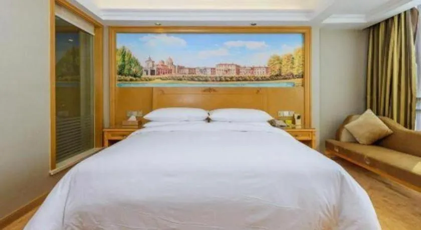 Bed in Vienna Hotel Guangxi Guilin Yongfu Station