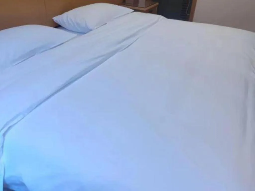 Bed in Vienna Hotel Guangxi Guilin Yongfu Station