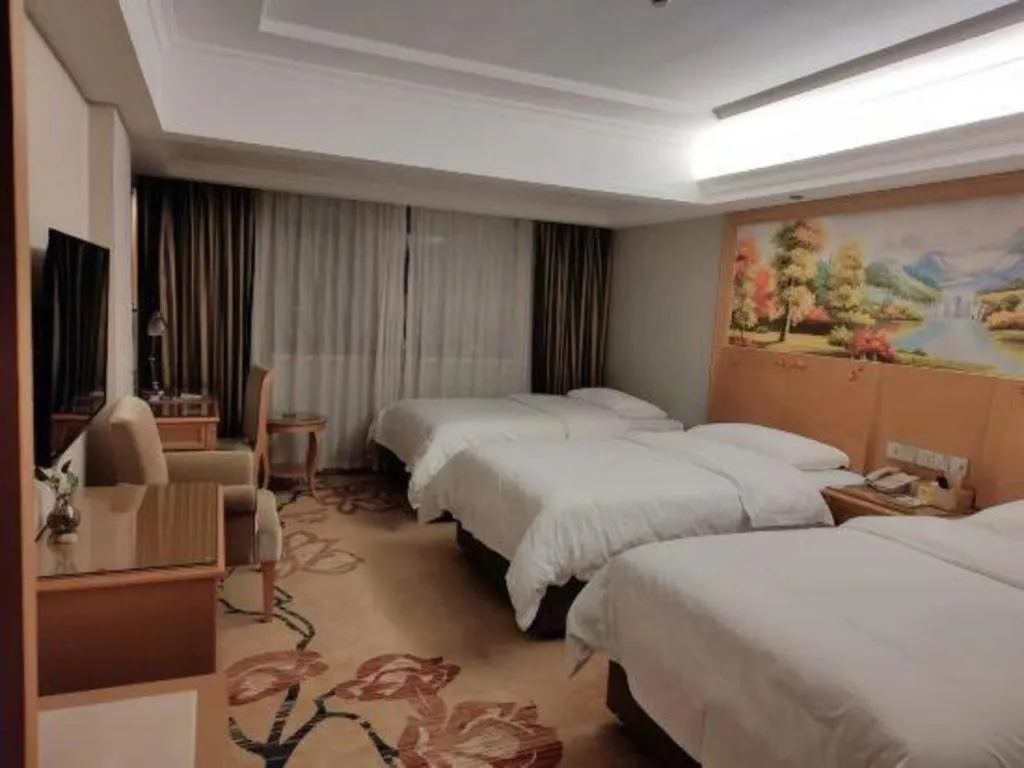 Bed in Vienna Hotel Guangxi Guilin Yongfu Station