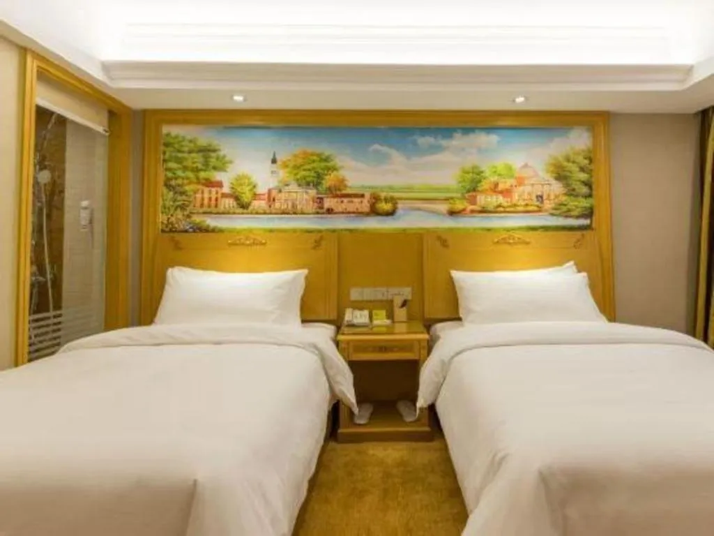 Bed in Vienna Hotel Guangxi Guilin Yongfu Station