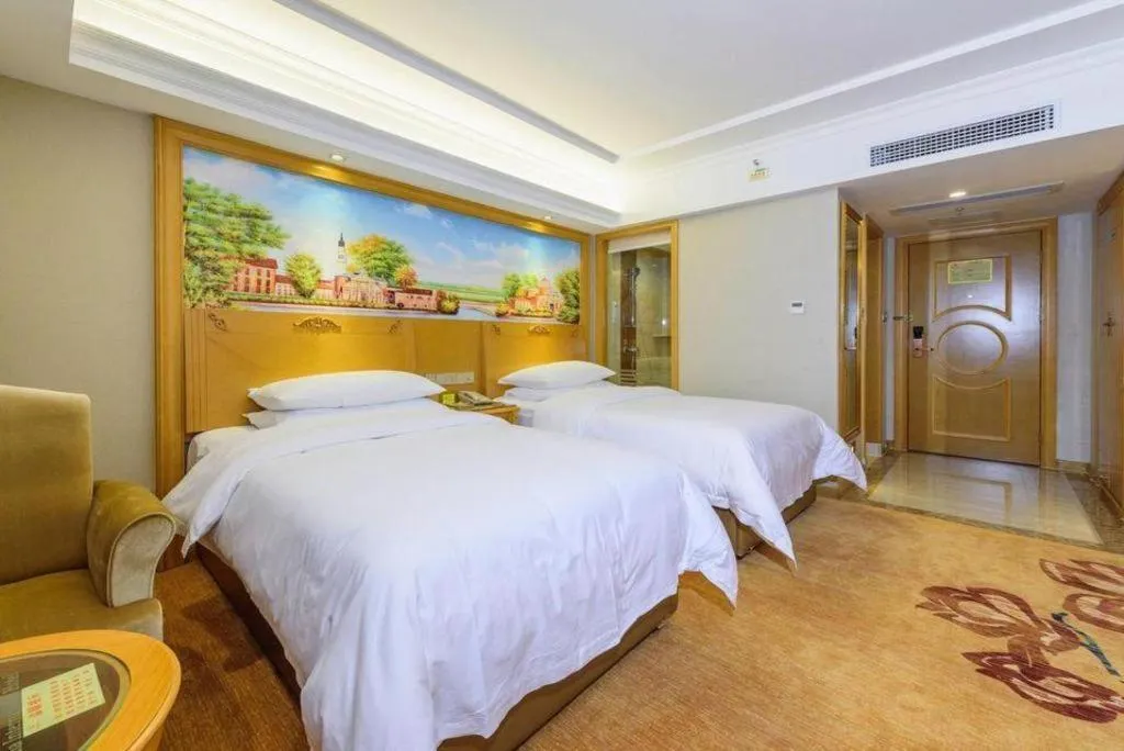 Bed in Vienna Hotel Guangxi Guilin Yongfu Station