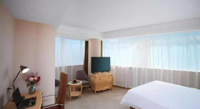 Bed in Vienna Hotel Shandong Dezhou Government Shopping Plaza