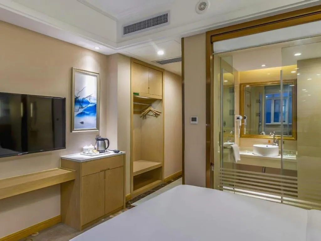 Bed in Vienna Hotel Shandong Dezhou Government Shopping Plaza