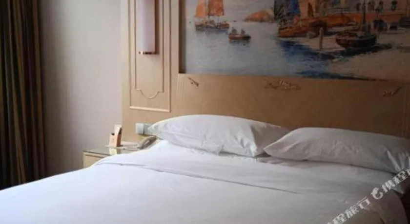 Bed in Vienna Hotel Shandong Dezhou Government Shopping Plaza