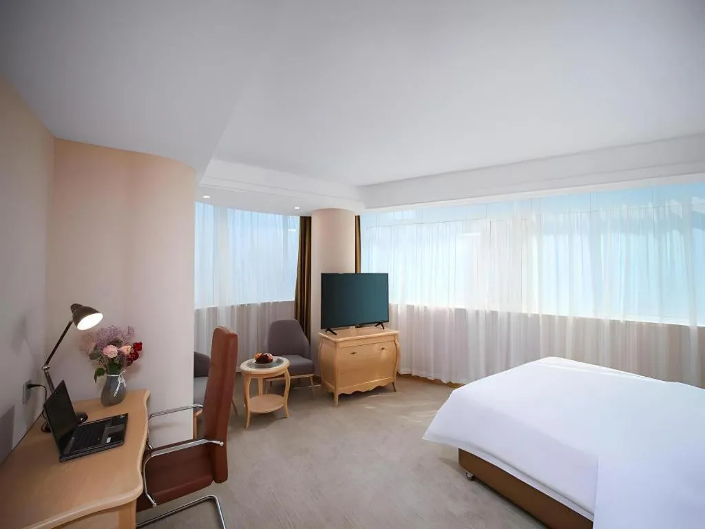 Bed in Vienna Hotel Shandong Dezhou Government Shopping Plaza
