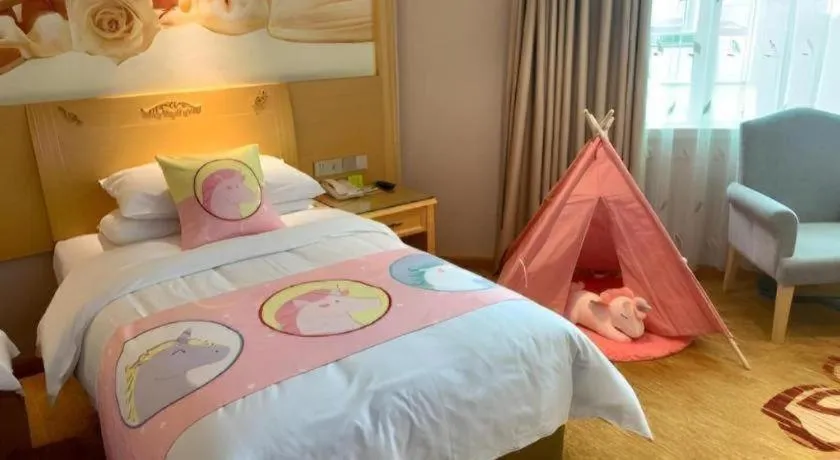 Bed in Vienna Hotel Guangxi Hezhou Guposhan Suifeng